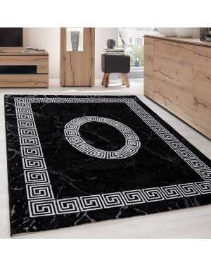 Modern design vloerkleed met zwart-witte randversiering van optisch marmer.