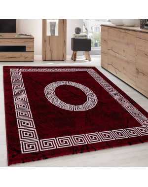 Modern design vloerkleed met een rand van optisch marmer in zwart, rood en wit.