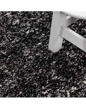 Hoogwaardig, pluizig woonkamerkleed in antracietgrijs met witte spikkels.