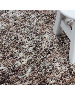 Hoogwaardig, pluizig woonkamerkleed in beige, taupe en crème met spikkels.