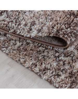 Hoogwaardig, pluizig woonkamerkleed in beige, taupe en crème met spikkels.