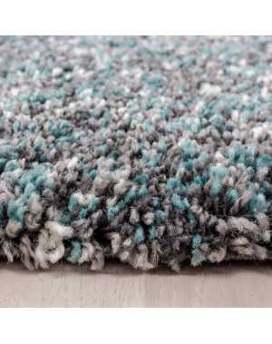 Hoogwaardig, pluizig woonkamerkleed in mintgroen, grijs en crème met spikkels.