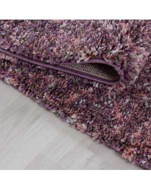 Hoogwaardig, pluizig woonkamerkleed in roze, paars, taupe, crème en gespikkelde uitvoering.