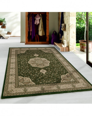 Oosterse laagpolige woonkamertapijt met sierlijke rand, groen