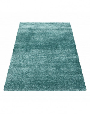 Modern, zacht, hoogpolig vloerkleed met een poolhoogte van 50 mm in aquablauw.